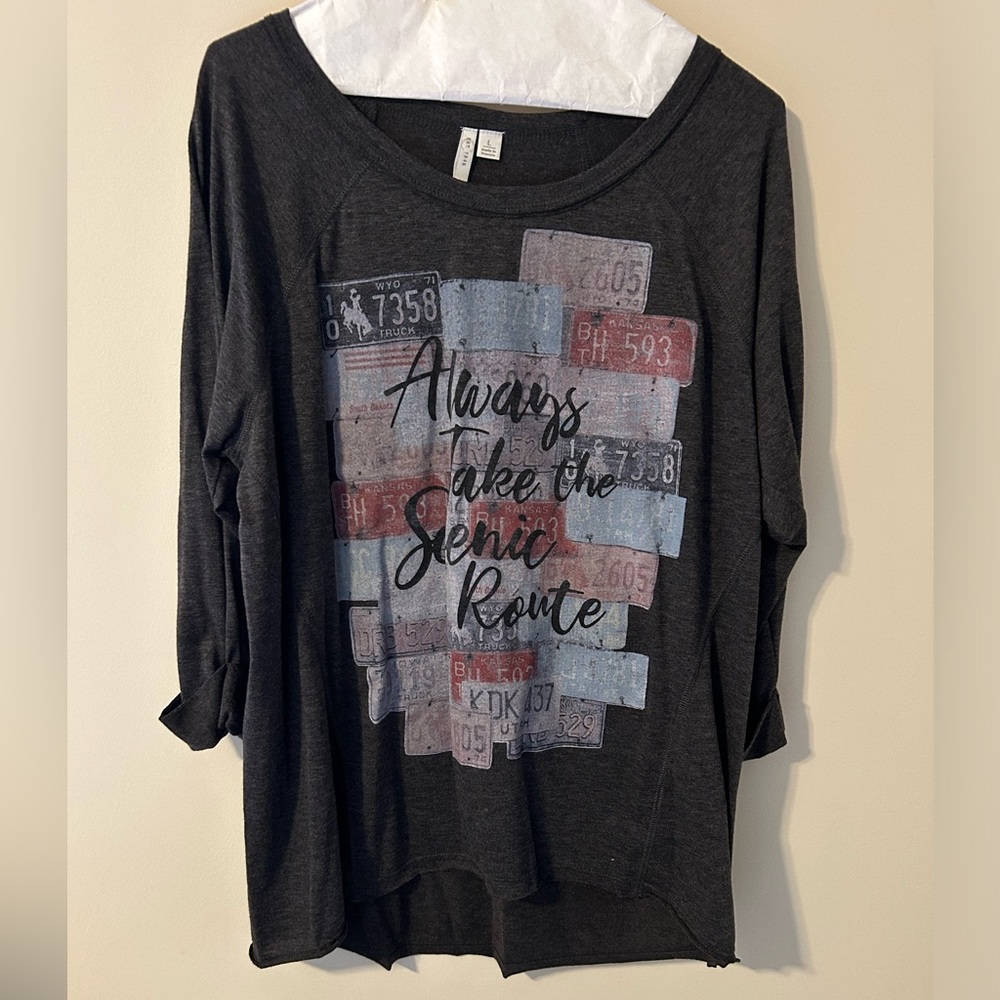 Quarter length sleeve graphic Tee